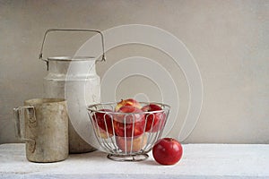 Old rustic aluminum cookwares and apples