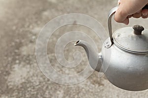 Old rustic aluminum kettle