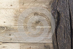 Old rustic beige wooden natural planks and dark wood board background