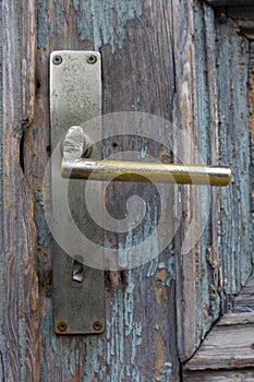 Old rustic brass door handle.