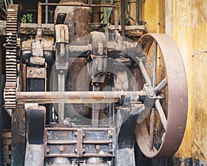 Old rustic factory machinery in abandoned factory