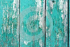 Old rustic painted cracky green, turquoise wooden texture or background