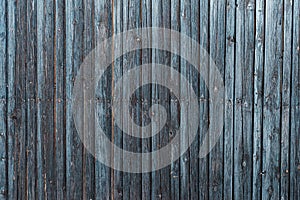 Old rustic pine wood wall painted in black as background