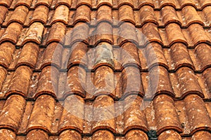 Old rustic terracotta roof tiles pattern as background