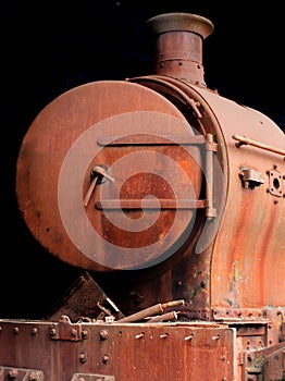 Old rusting abandoned steam locomotive photo