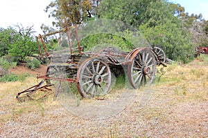 Old and rusting Australian pioneers horse drawn wagon photo