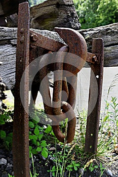 An old rusting chain and hook