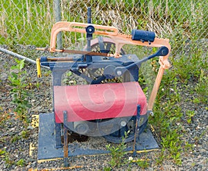 Old rusting equipment at an outdoor display in yellowknife