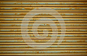 Old rusting metal security shutters texture