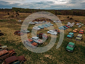 Old rusty abandoned retro cars, aerial view