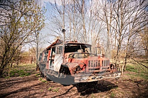 Old rusty abandoned Soviet fire truck in Chernobyl exclusion zone