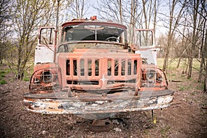 Old rusty abandoned Soviet fire truck in Chernobyl exclusion zone