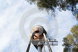 An old rusty abandoned water tower