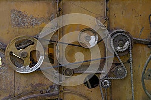 Old rusty agricultural machinery. Close-up Of Abandoned harvester, tractor