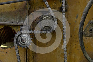 Old rusty agricultural machinery. Close-up Of Abandoned harvester, tractor