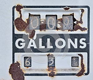 Old rusty american gas pump panel.