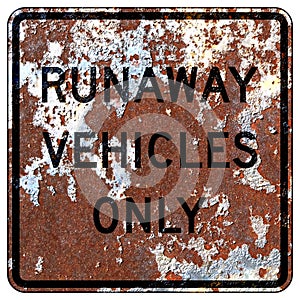 Old rusty American road sign - Runaway vehicles only