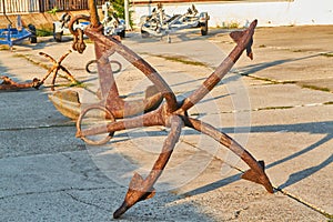 Old rusty anchor in the seaport Anapa