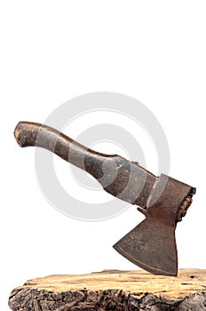 Old rusty axe with wooden handle stuck in the stump, on a white background
