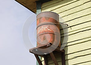 Old rusty barrel for rainwater