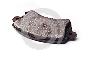 Old rusty brake pad isolated