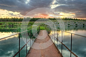 Old rusty bridge under sunset