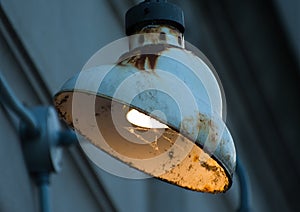 Old rusty building lamp