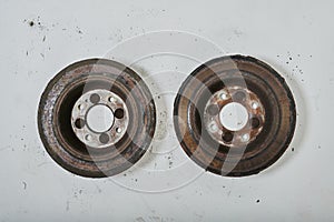 old rusty car brake discs taken from the car