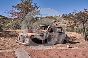 Old rusty car wreck abandoned in Namibia