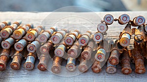 Old rusty cartridges in a machine-gun belt. war in Ukraine. military ammunition