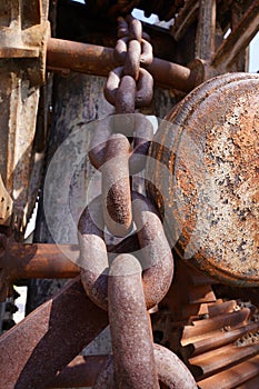 Old rusty chain abandoned industrial ship crane