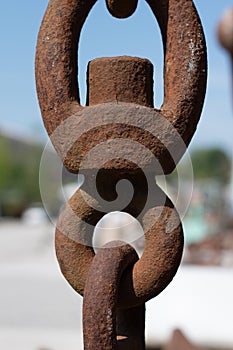 Old, rusty chain rings, interlocking ring chains photo