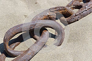 Rusty chain at the beach