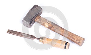 Old rusty chisel and hammer isolated