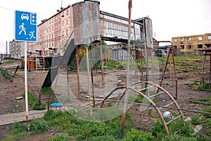 Old rusty damaged playground at Chersky town district Kolyma reg