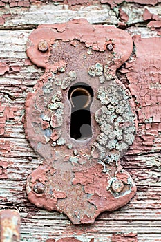 Old, rusty, decay, cracked, vintage, red steel lock, keyhole