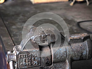 Old rusty dirty metal vise for work.