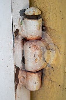 Old rusty door hinge