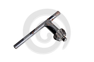 old rusty drill key on a white background