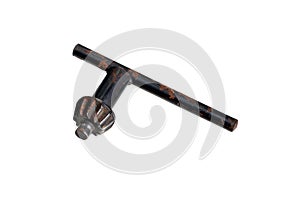 old rusty drill key on a white background