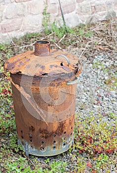 Old rusty dustbin incinerator