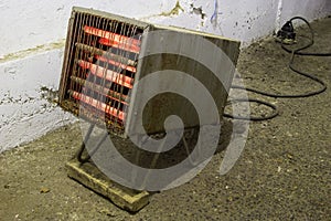 Old rusty electrical heating calorifier, heater photo