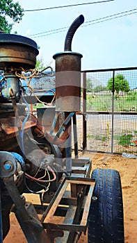 Old rusty electricity generator vertical photo