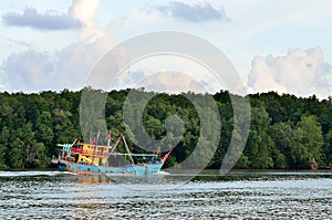 An old, rusty fishing trawler