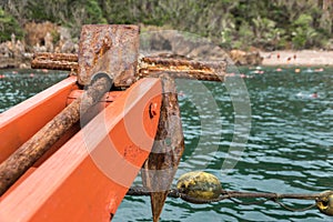 Old rusty folding grapnel anchor
