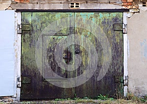 Old rusty garage doors closed