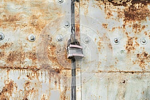 Old rusty gates with padlocks