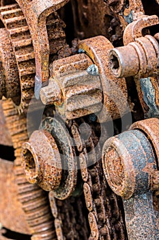 Old rusty gear wheels. grunge metal machinery details closeup.