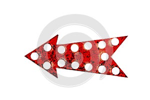 Old rusty and grungy red arrow as a vintage bright and colorful illuminated display retro arrow frame with glowing light bulbs