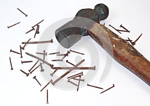 Old rusty hammer and nails